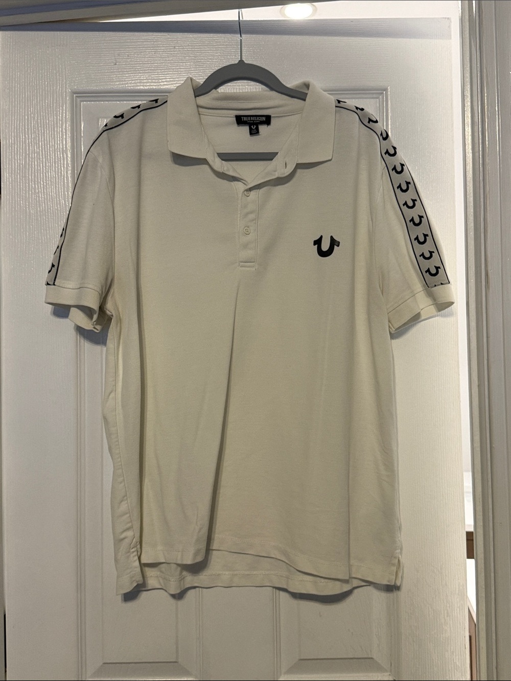 True Religion Men’s white Polo with Black Horseshoe and Shoulder Tape